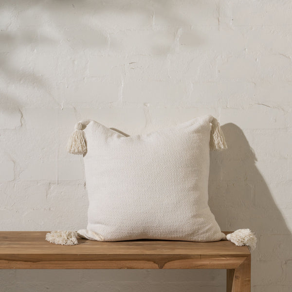 Cream Textured Cotton Cushion with Tassels - Sarah Urban